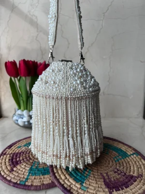 Tan Velvet Potli with Scalloped Pearl Detailing and Elegant Drawstring Finish