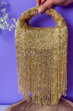 Gold Tasseled Potli with Beaded Tassels and Contemporary Glam Detailing
