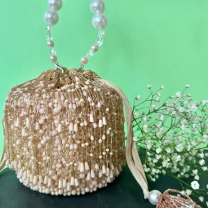 Pink Jewel and Crystal Studded Potli with Dazzling Festive Finish