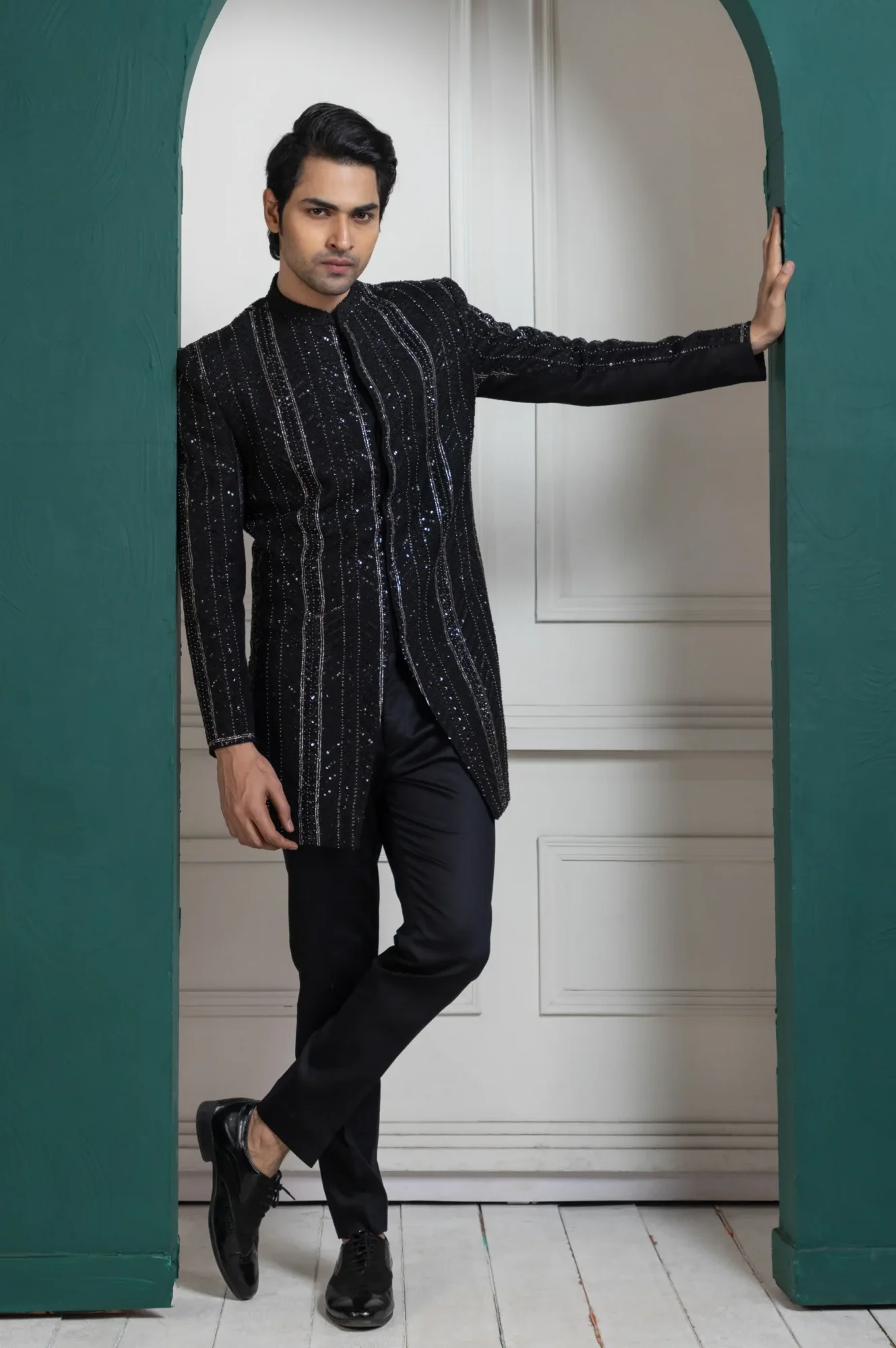 Black Embellished Bandhgala Jacket with vertical striped detailing from Golden Muslin By Anuj Agarwal