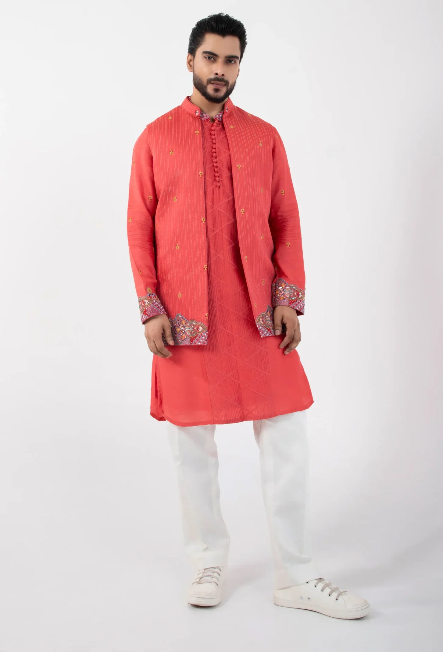Coral Embroidered Bandi Jacket with gold motifs and handcrafted border from Golden Muslin By Anuj Agarwal