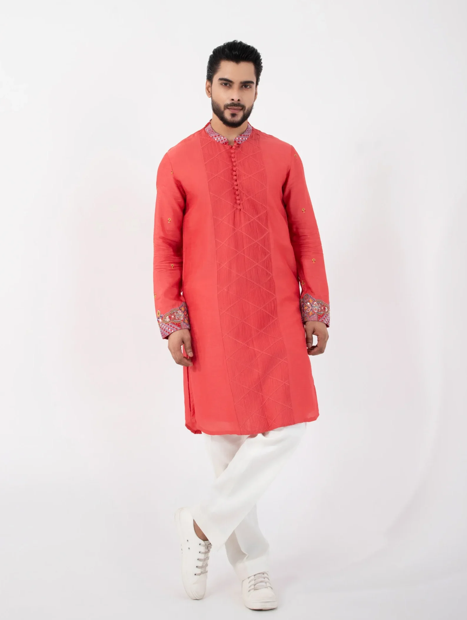 Coral Embroidered Kurta Set with white trousers from Golden Muslin By Anuj Agarwal