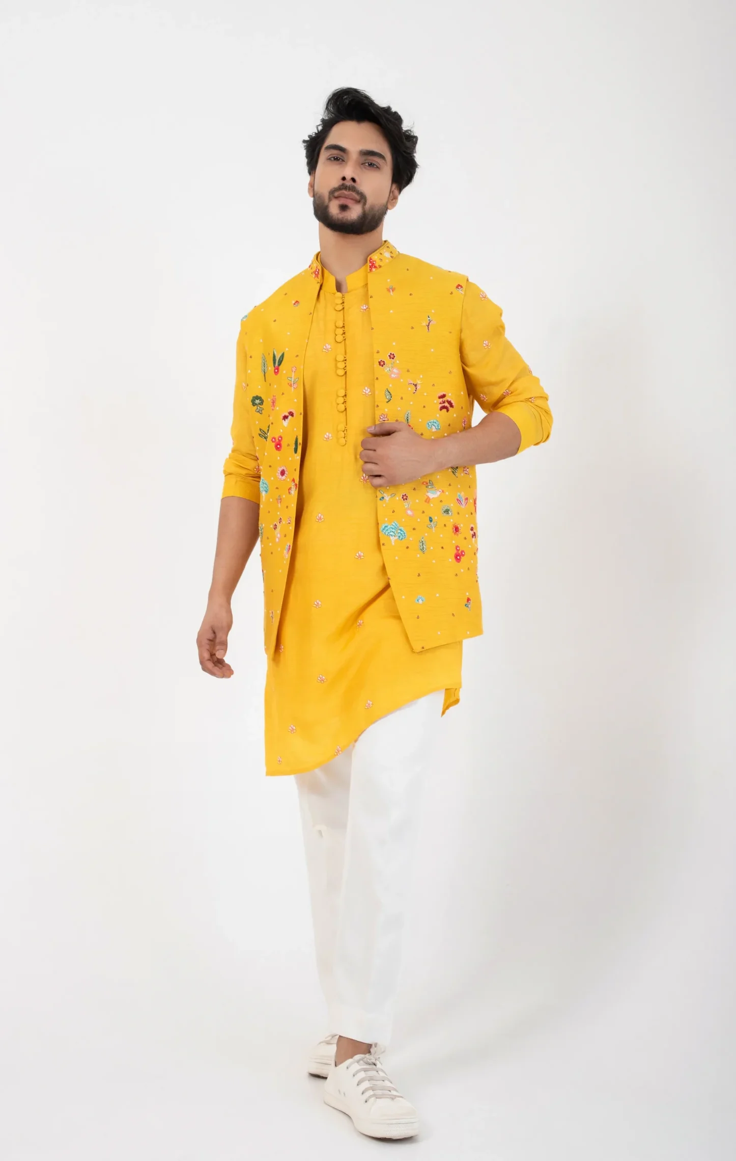 Marigold Yellow Nehru Jacket with embroidered Asymmetric Kurta Set from Golden Muslin By Anuj Agarwal
