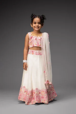 Ivory embroidered lehenga and choli with dupatta