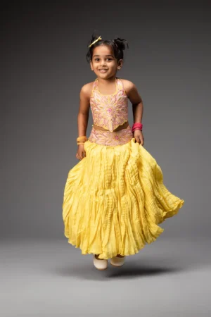 Lemon yellow crinckled lehenga with embroidered choli top