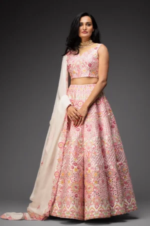 Ivory embroidered lehenga and choli with dupatta