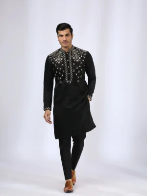 Black Embroidered Kurta teamed with matching narrow pants