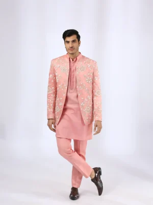 Peach Embroidered Jacket teamed with matching kurta and narrow pants