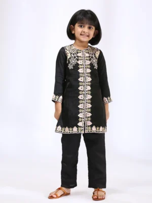 Black Embroidered Kurta teamed with matching narrow pants