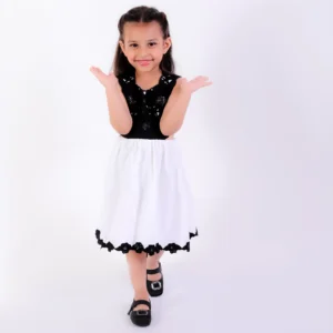 Ivory and black cutout dress