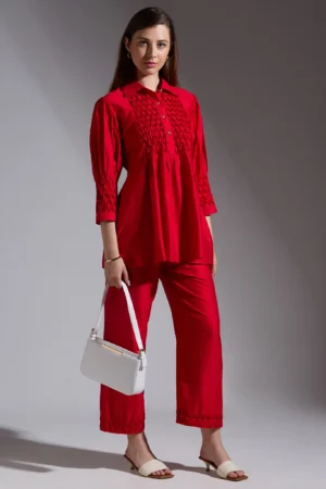 Red smocked top with matching pants