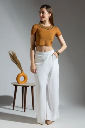Brown crop top with hand embroidered detail on neckline