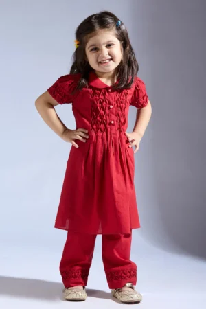 Red smocked top with matching pants