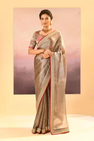 Earthy Dark Green Metallic Tissue Saree with Embroidered Border and Designer Stitched Blouse